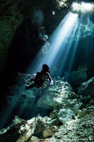Our guide Nico pauses to admire the light in Tajma Ha cenote. ISO 5000, f/5, 1/30