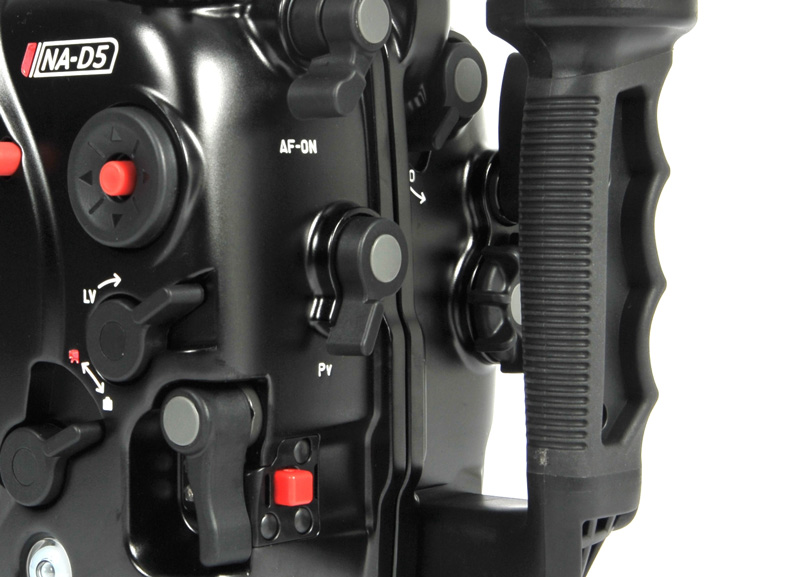 The Pv function, formerly known as Depth of Field Preview, is located next to the lens mount on the front of the body. This control is re-routed to the housing back, effectively serving as a second thumb lever capable of controlling one of dozens of assignable functions.