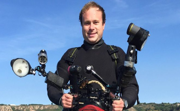 Josh Dearing and his father, rescued and returned the underwater camera to its owner.