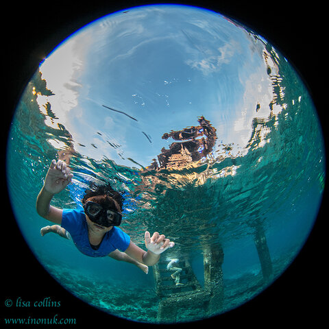 Children come to play during our last day diving Bunaken Marine Park.