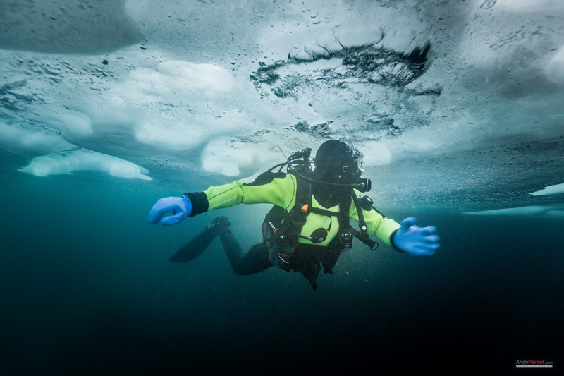 Here I'm under the ice in Tignes, France. The bottom of the ice is developing relief due to the bubbles exhaled by passing divers. Photo: Andy Parant