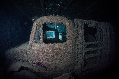 Trucks parked in the hold of the Thistlegorm, Red Sea.