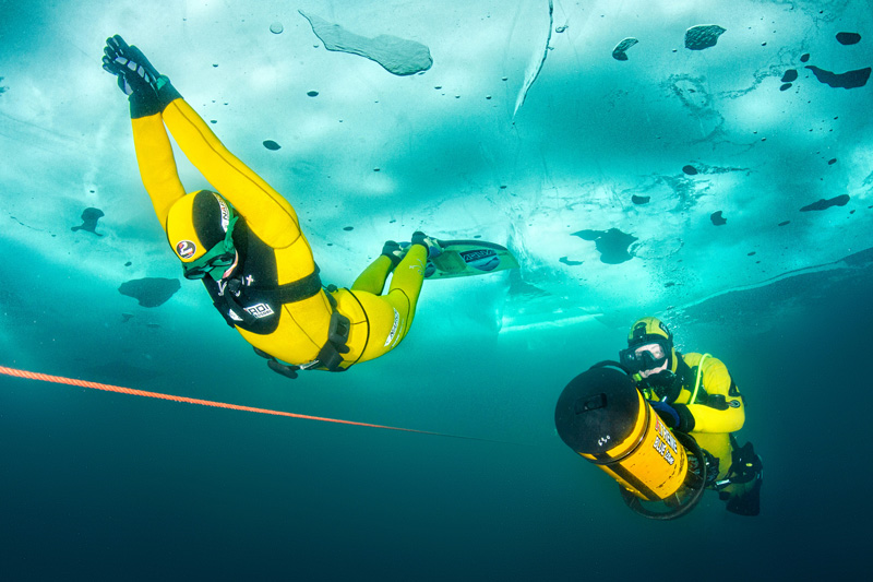 Valentina swims by, followed closely by a safety diver. Photo: Predrag Vuckovic