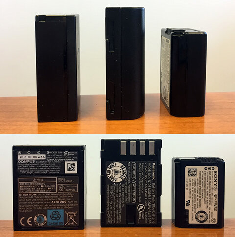 Battery size comparison between the Olympus E-M1 Mk II, Panasonic GH5, Sony a7R II.