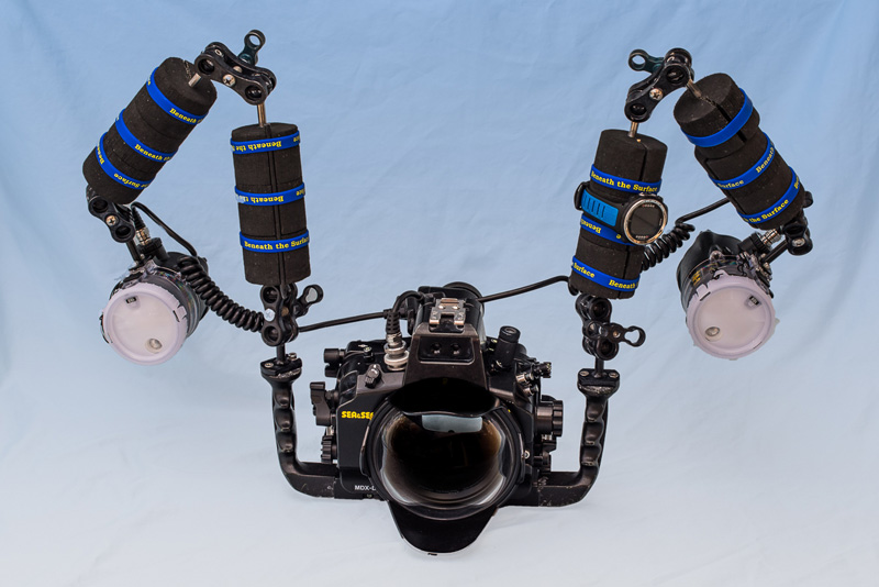 Strobes placed about 8 - 12 inches from the housing.