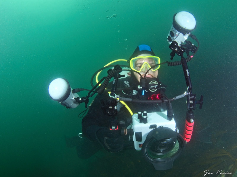 Underwater Photography Guide Editor-in-Chief, Nirupam Nigam, with the Ikelite Sony a6400 underwater housing, Sony 10-18mm rectilinear wide angle lens, and dual Ikelite DS-161. Photo by Jan Kocian