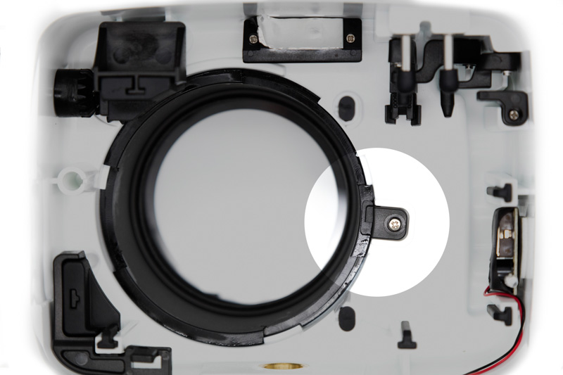 Inside view of housing showing port lock Inside view of housing showing port lock