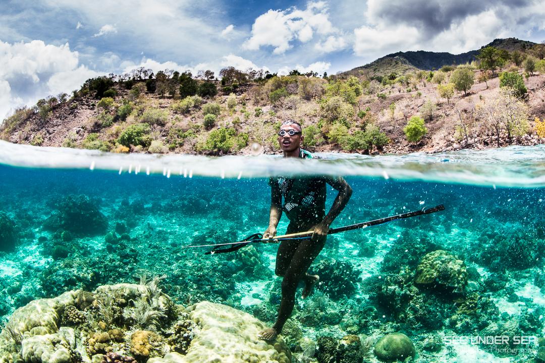 A local man spearfishing on the Alor reefs